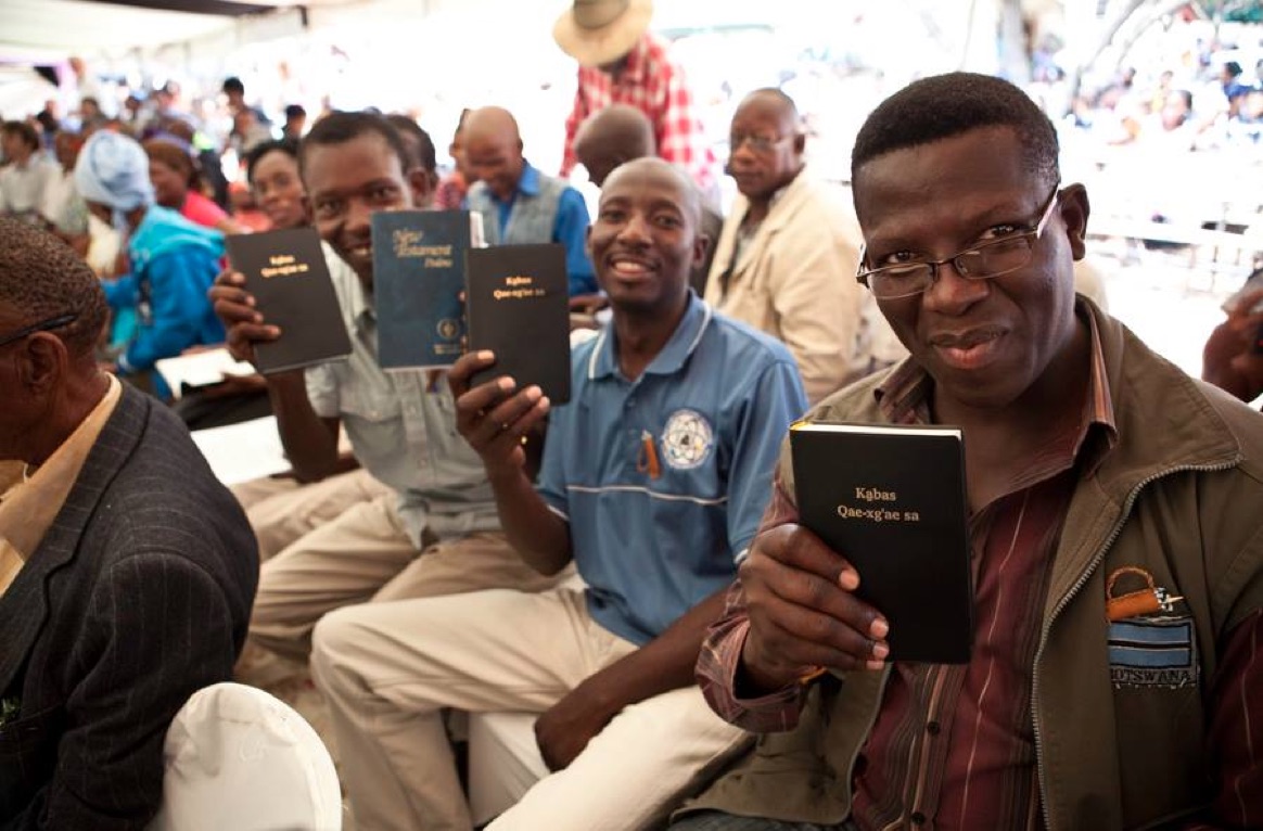 Men Holding Bibles